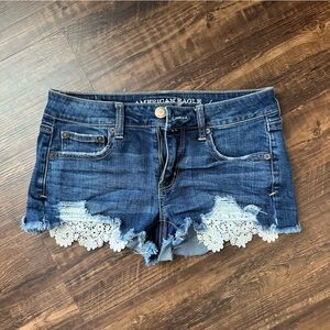American Eagle Outfitters Lace-Trimmed Denim Shortie Shorts - 4